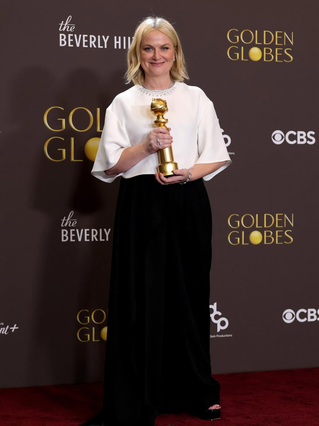 Amy Poehler Takes Home Golden Globes’ First Podcast Trophy Beating Ex-Husband Will Arnett