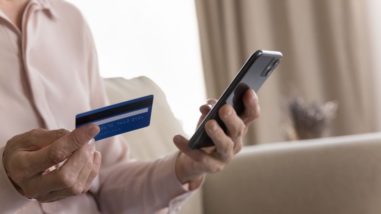 Reading debit card information to scammer