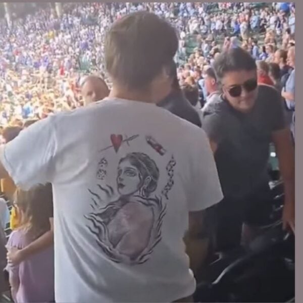 A man was smacked on the head by another fan