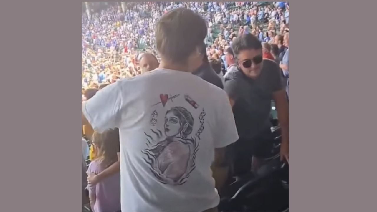 A man was smacked on the head by another fan