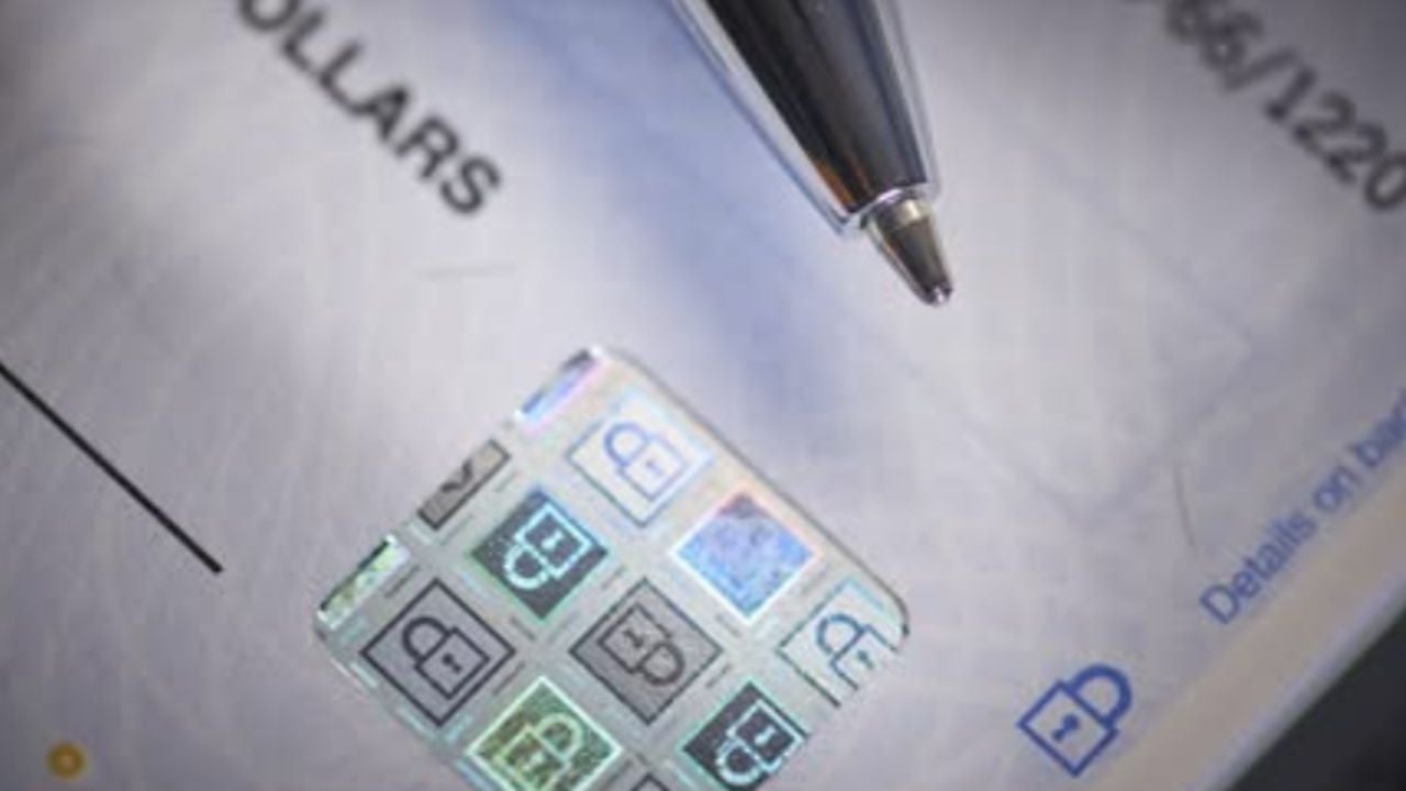 foil security hologram embedded on a bank check