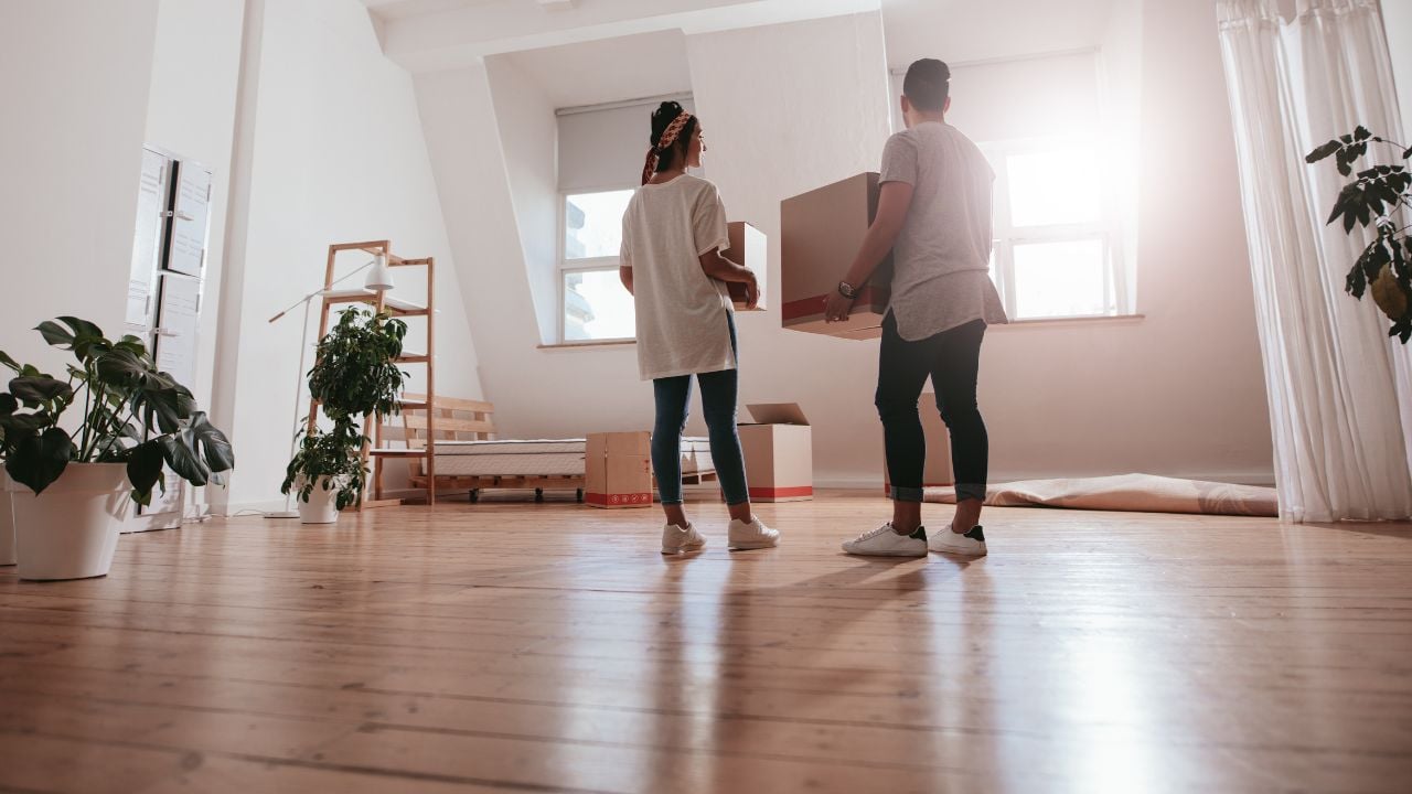 communications fraud Family moving boxes into a house