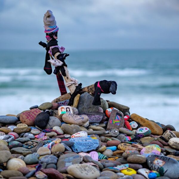 A creative rock arrangement of Dobby's Grave from the Harry Potter movie franchise at Freshwater West Beach in Pembrokeshire, Wales