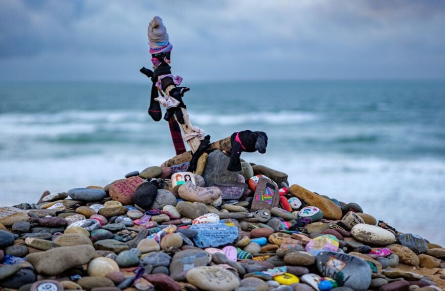 A creative rock arrangement of Dobby's Grave from the Harry Potter movie franchise at Freshwater West Beach in Pembrokeshire, Wales