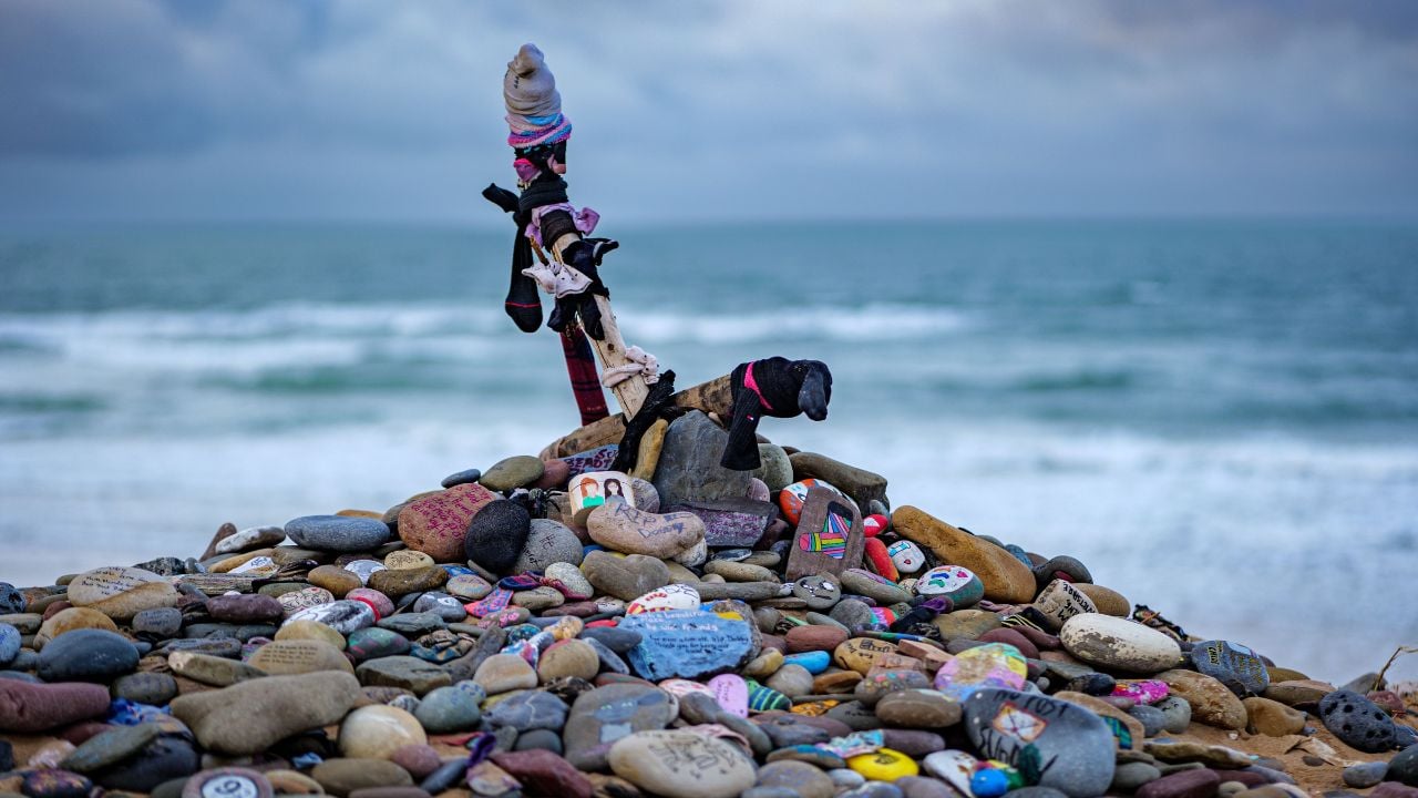 A creative rock arrangement of Dobby's Grave from the Harry Potter movie franchise at Freshwater West Beach in Pembrokeshire, Wales