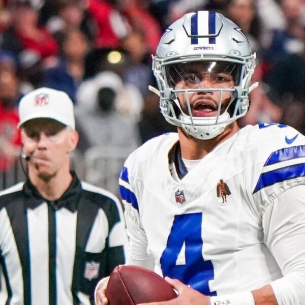 ATLANTA, GA-NOV 3: Dallas Cowboys quarterback Dak Prescott (4) looks to throw the ball against the Atlanta Falcons on November 3, 2024 at Mercedes-Benz Stadium.