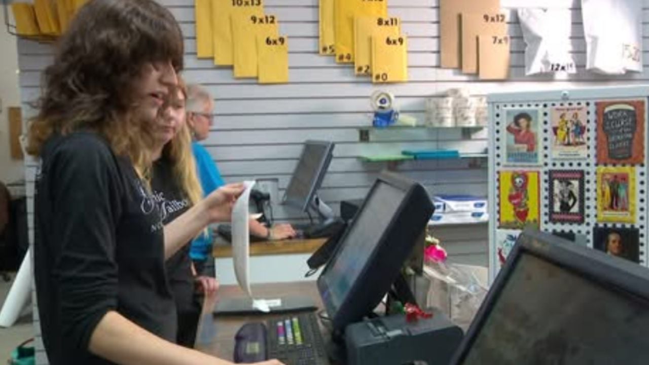 an employee at Graphic Mailbox in Northfield, Minnesota