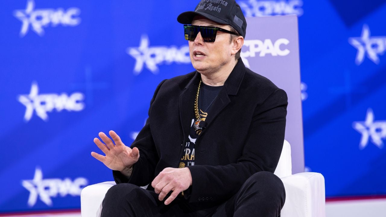 NATIONAL HARBOR, MD, USA — February 20 2025: Elon Musk speaks with Newsmax Host Rob Schmitt on day 1 of the 2025 Conservative Political Action Conference.