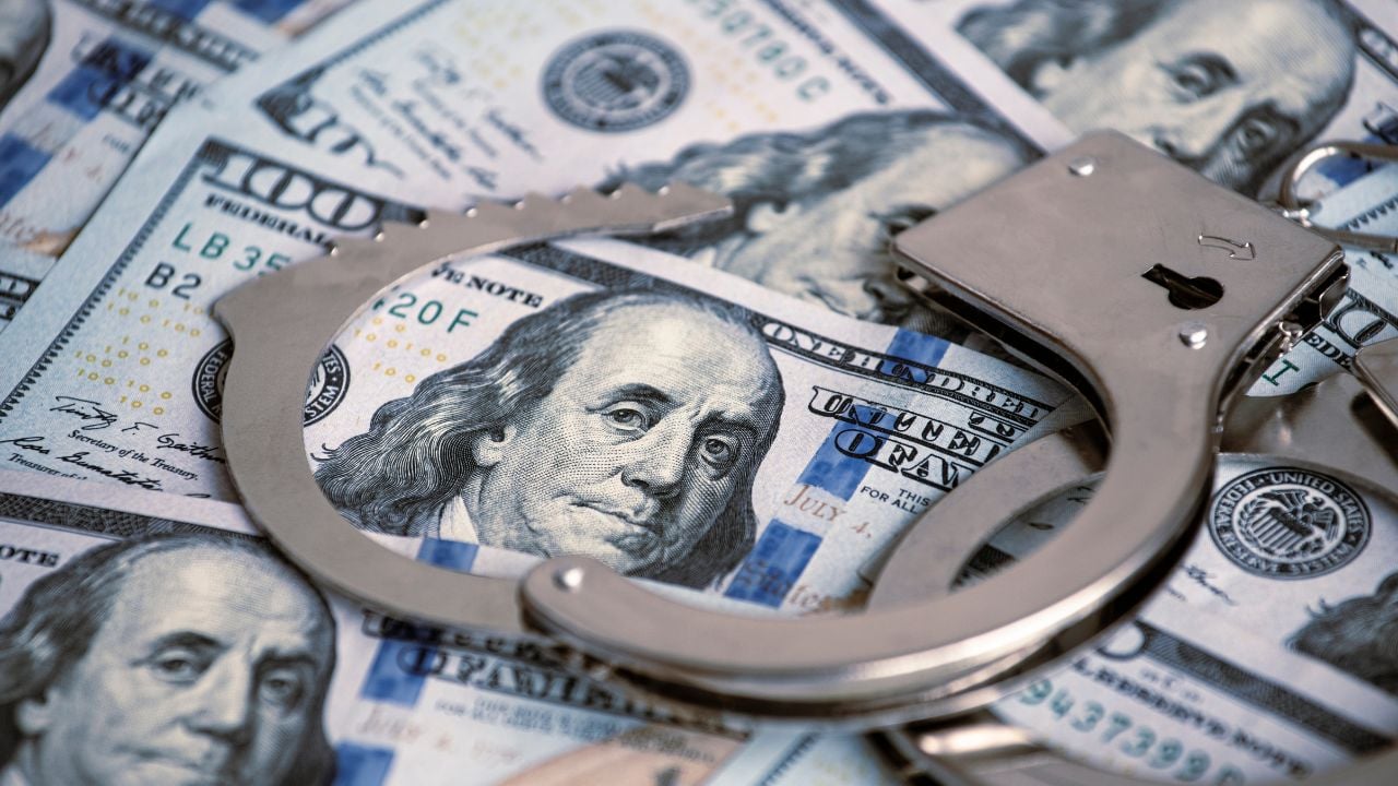 American dollars and handcuffs