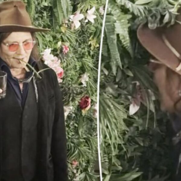 Johnny Depp Bites Into Decorative Greenery During Las Vegas Party and Then Goes Back for More